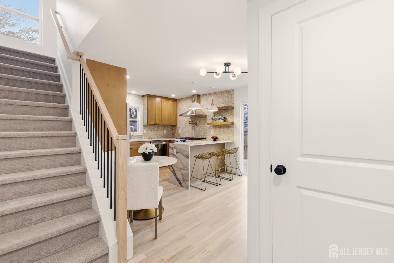 23 Morse Avenue Edison, NJ 08817 - Photo 8 of 31 a view of a kitchen with furniture and wooden floor