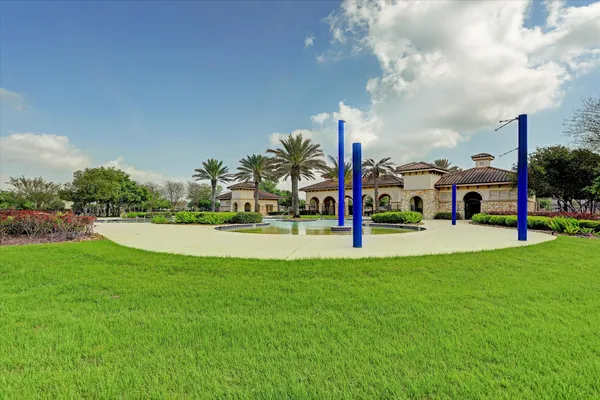 a view of a park with swings and slides