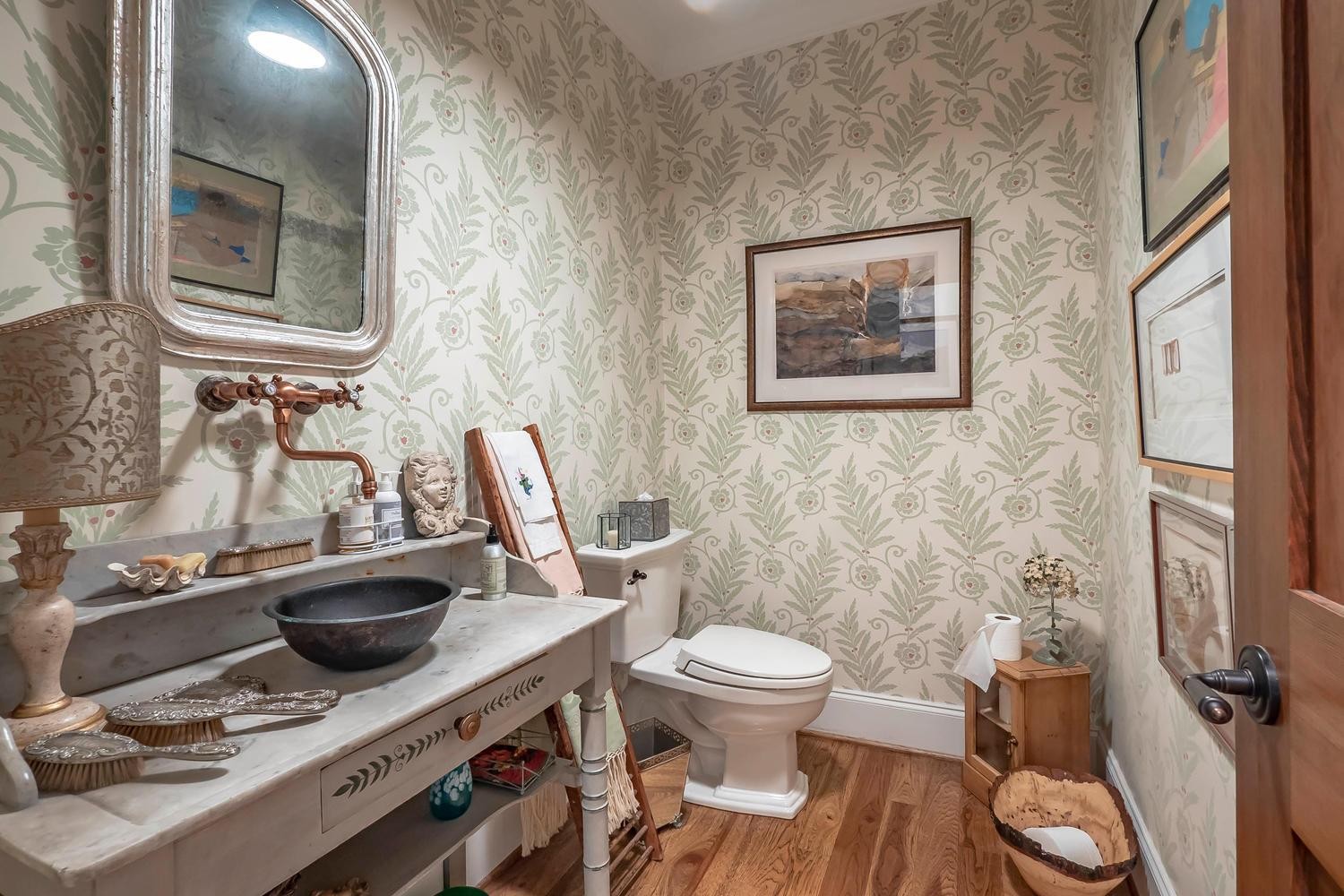 5178 Old Harding Road Franklin, TN 37064 - Photo 15 of 26 a bathroom with a toilet a sink and mirror