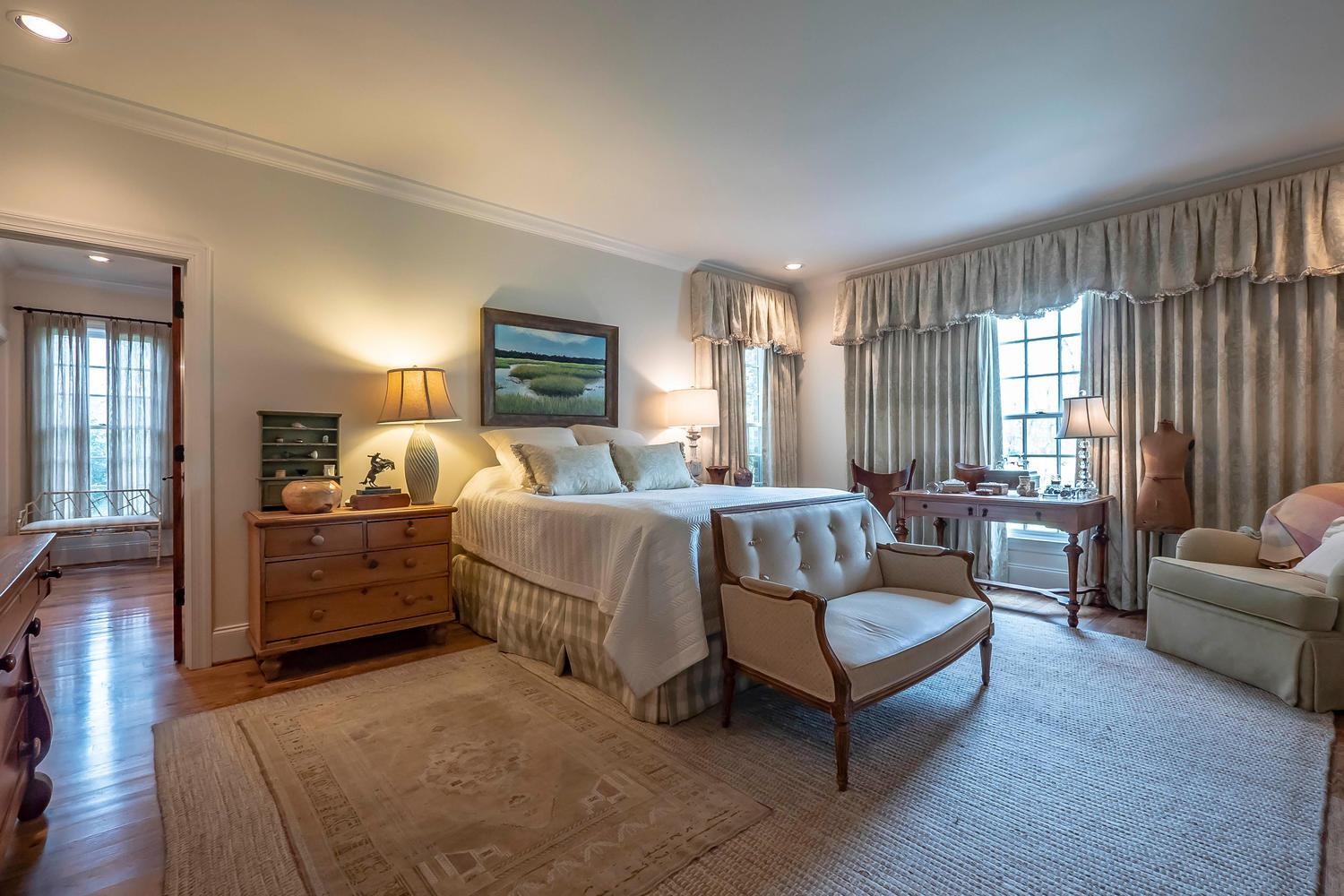 5178 Old Harding Road Franklin, TN 37064 - Photo 16 of 26 a spacious bedroom with a bed and a couch