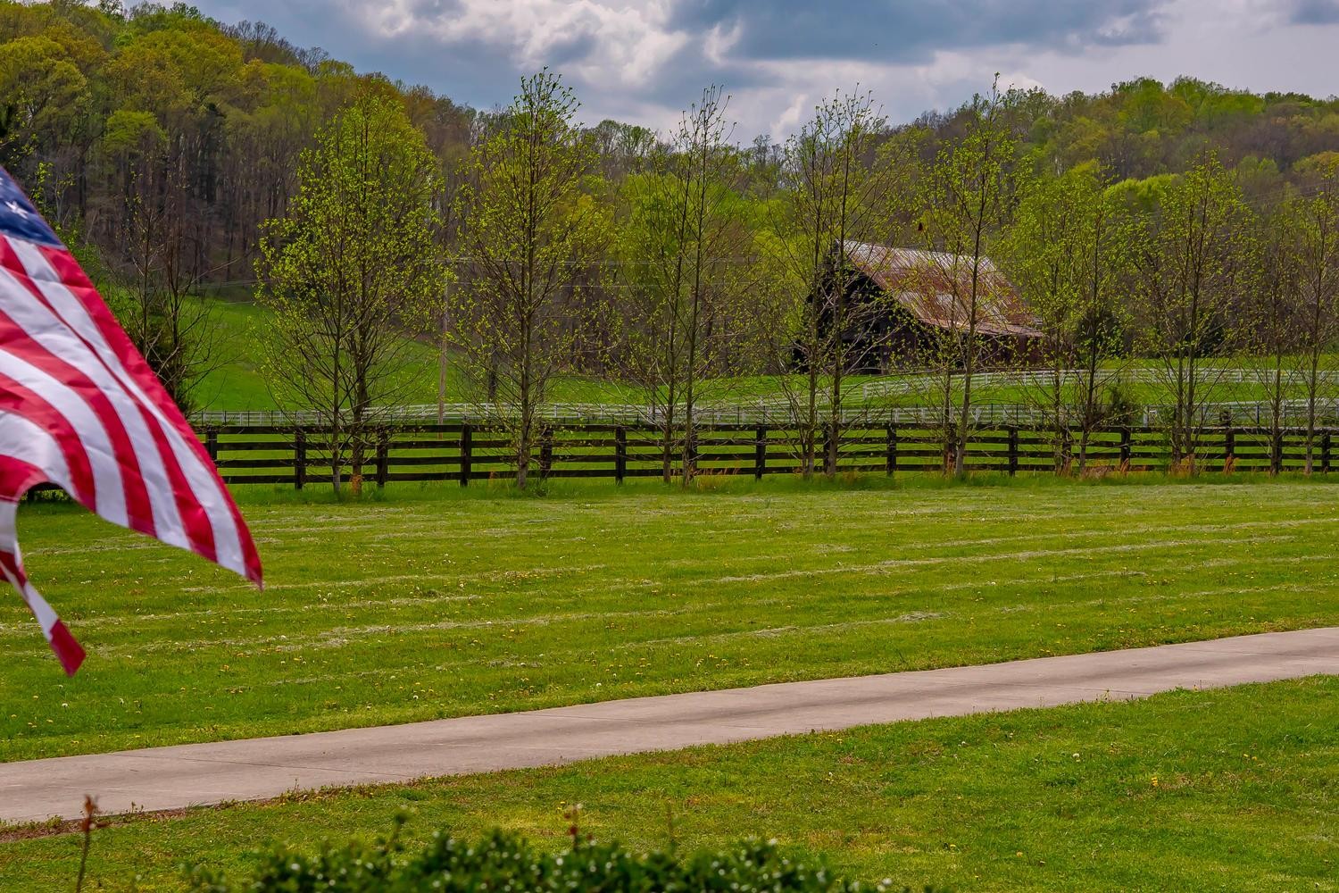 5178 Old Harding Road Franklin, TN 37064 - Photo 25 of 26 a view of a golf course with a lake