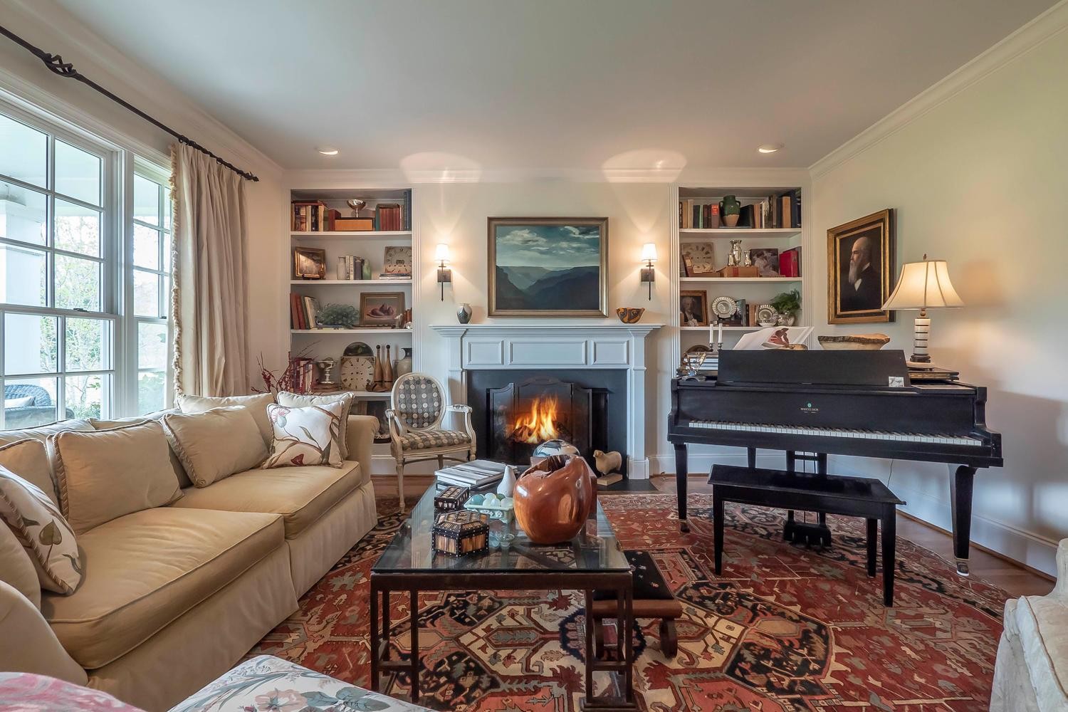 5178 Old Harding Road Franklin, TN 37064 - Photo 7 of 26 a living room with furniture a flat screen tv and a fireplace