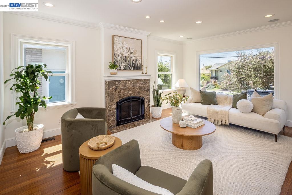 1329 Ordway Street Berkeley, CA 94702 - Photo 14 of 47 a living room with furniture and a fireplace