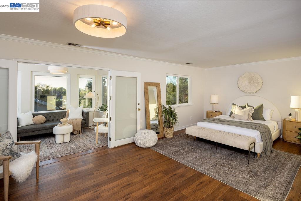 1329 Ordway Street Berkeley, CA 94702 - Photo 20 of 47 a bedroom with furniture and a large window