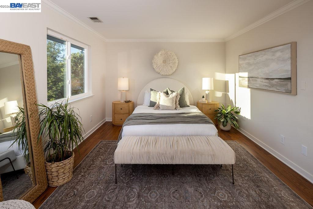 1329 Ordway Street Berkeley, CA 94702 - Photo 21 of 47 a spacious bedroom with bed and a large window