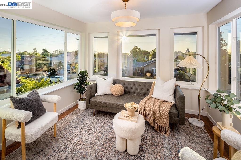1329 Ordway Street Berkeley, CA 94702 - Photo 22 of 47 a living room with furniture and a large window