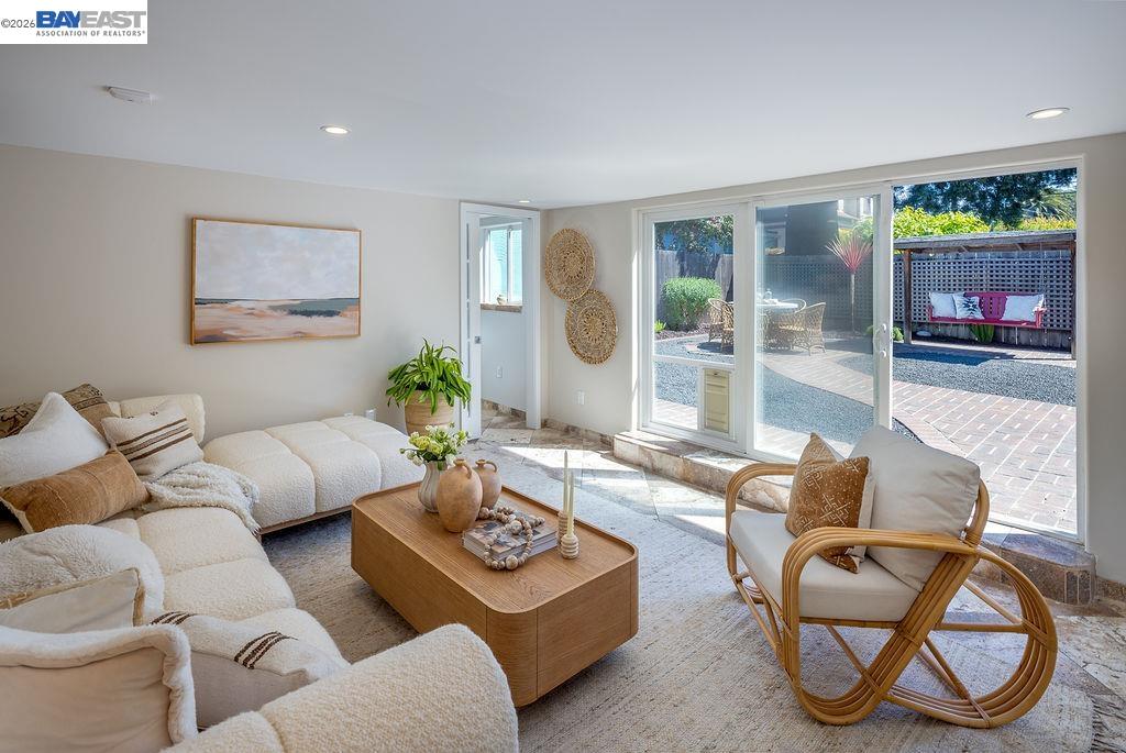 1329 Ordway Street Berkeley, CA 94702 - Photo 35 of 47 a living room with furniture and a large window
