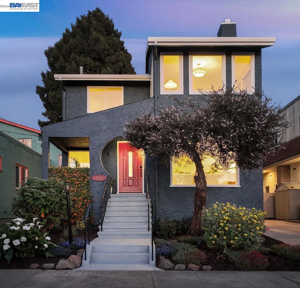 1329 Ordway Street Berkeley, CA 94702 - Photo 4 of 47 a front view of a house with a yard