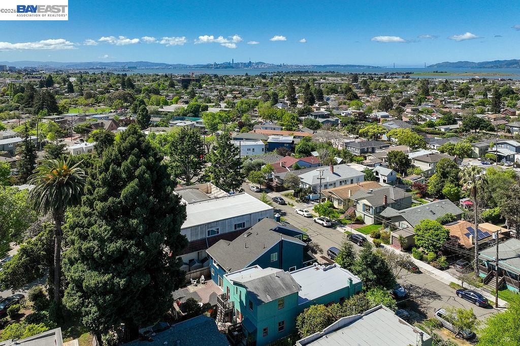 1329 Ordway Street Berkeley, CA 94702 - Photo 41 of 47 an aerial view of a house with a yard swimming pool and outdoor seating