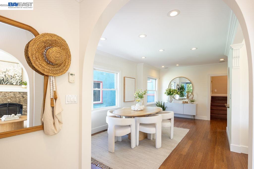 1329 Ordway Street Berkeley, CA 94702 - Photo 9 of 47 a view of a dining room with furniture window and wooden floor
