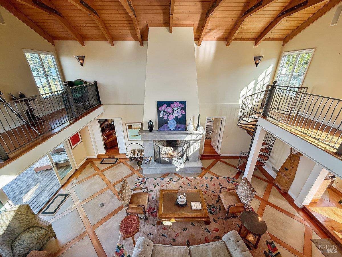 1000 Wolf Ridge Road Glen Ellen, CA 95442 - Photo 15 of 70 a living room with furniture and a flat screen tv