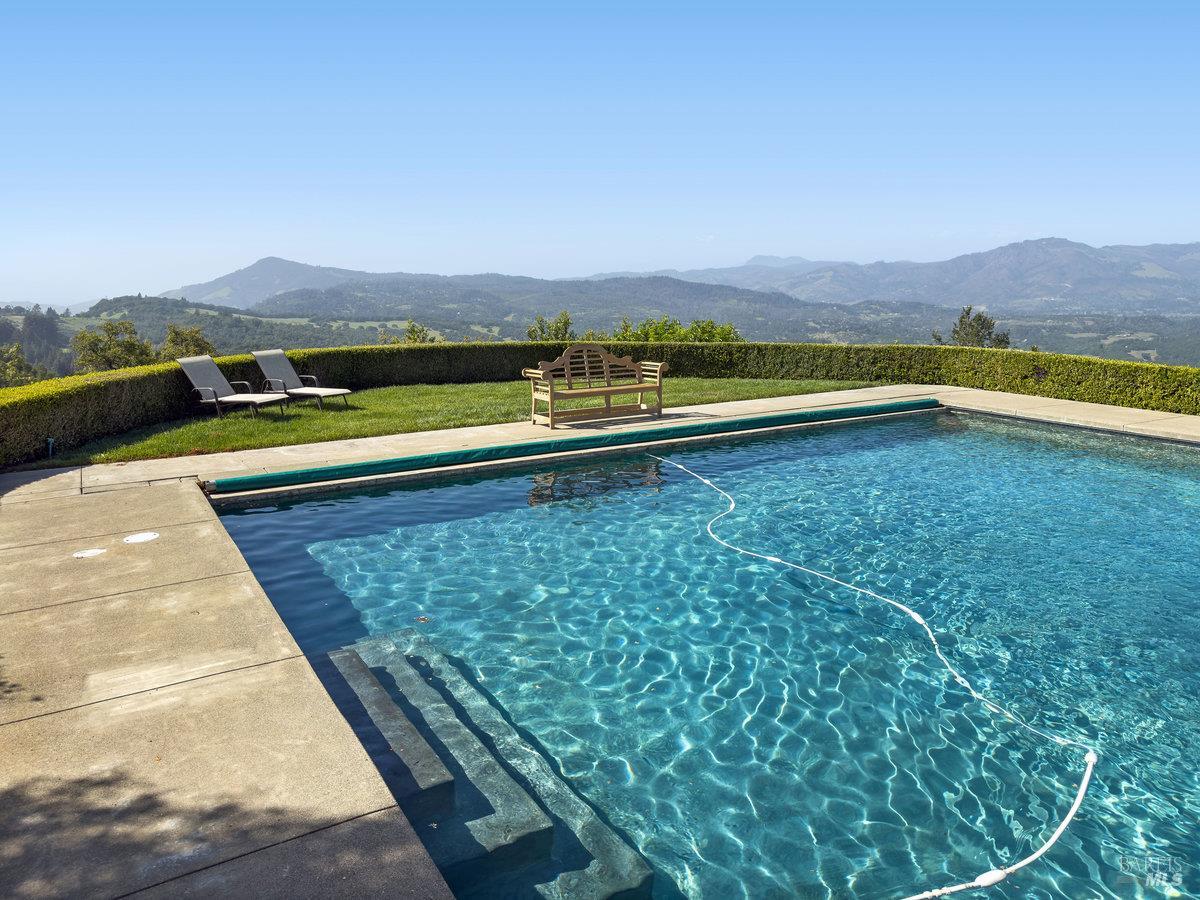 1000 Wolf Ridge Road Glen Ellen, CA 95442 - Photo 2 of 70 a view of a terrace with a yard and mountain view