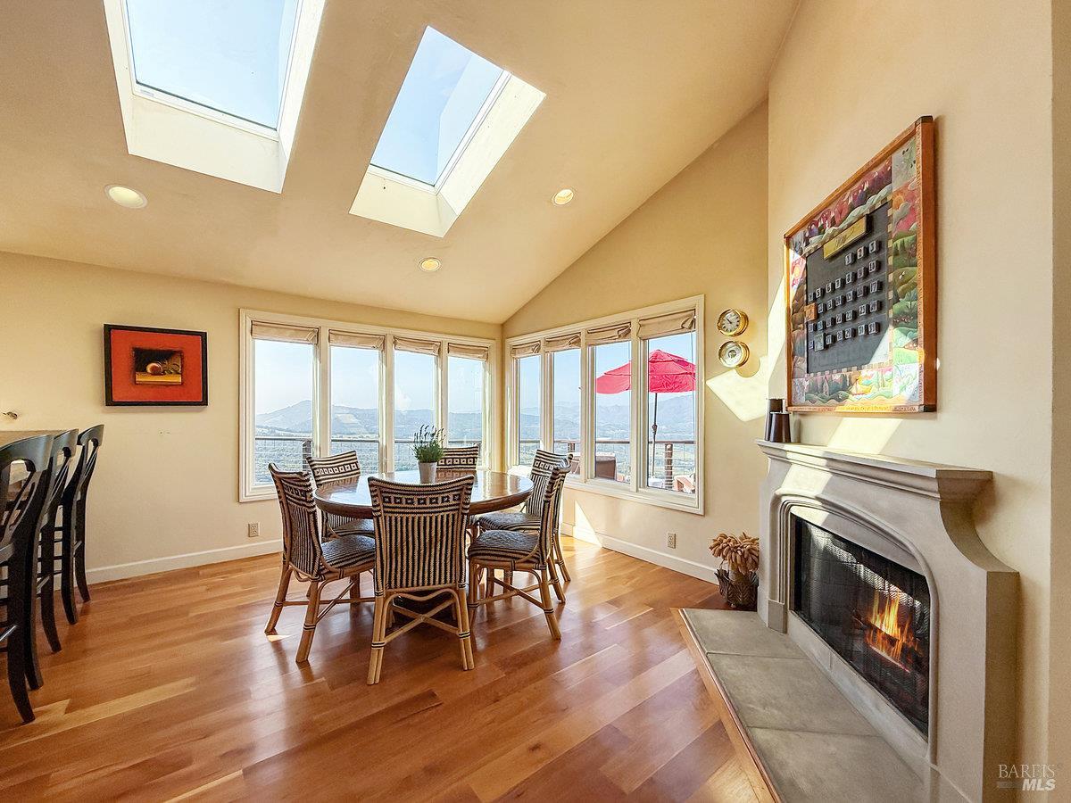 1000 Wolf Ridge Road Glen Ellen, CA 95442 - Photo 23 of 70 a view of a dining room with furniture window and wooden floor
