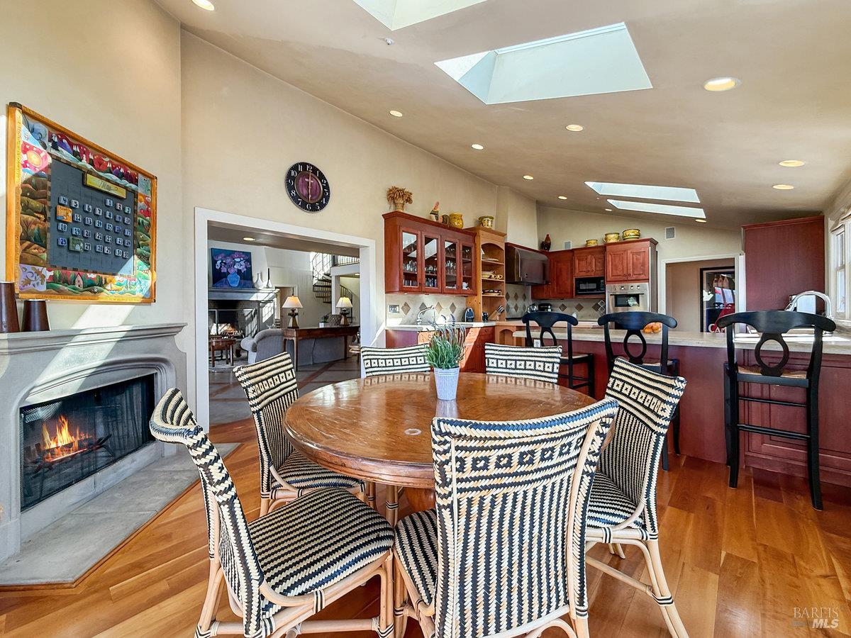 1000 Wolf Ridge Road Glen Ellen, CA 95442 - Photo 25 of 70 a living room with furniture a flat screen tv and a fireplace