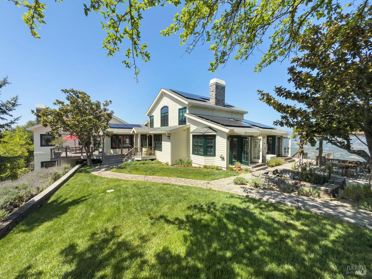 1000 Wolf Ridge Road Glen Ellen, CA 95442 - Photo 3 of 70 a front view of a house with a yard