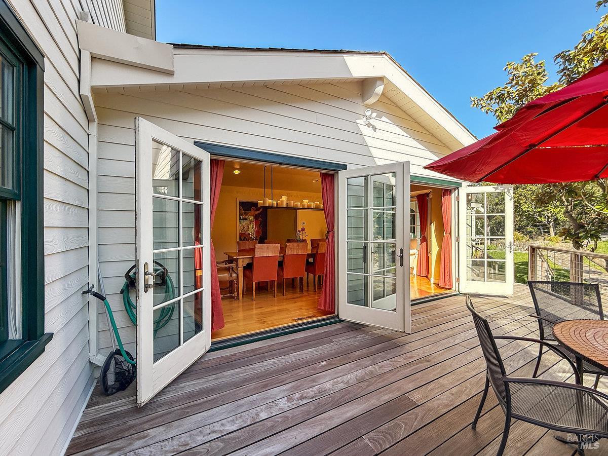 1000 Wolf Ridge Road Glen Ellen, CA 95442 - Photo 37 of 70 a view of a house with a porch and furniture