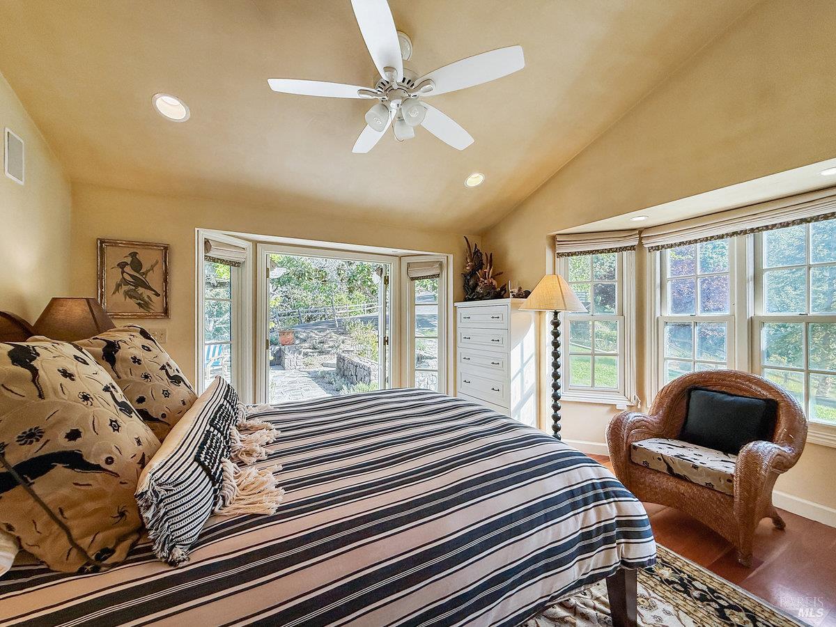 1000 Wolf Ridge Road Glen Ellen, CA 95442 - Photo 46 of 70 a bedroom with a bed and a couch