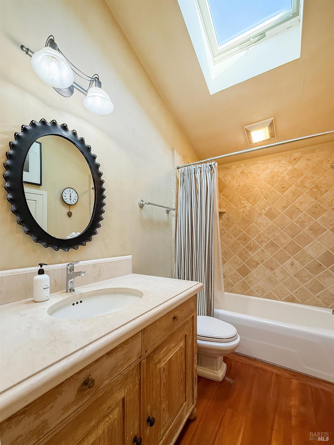 1000 Wolf Ridge Road Glen Ellen, CA 95442 - Photo 50 of 70 a bathroom with a sink and a mirror
