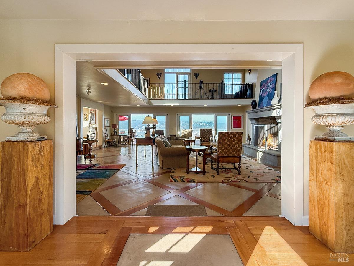 1000 Wolf Ridge Road Glen Ellen, CA 95442 - Photo 6 of 70 a living room with lots of furniture and a view of kitchen