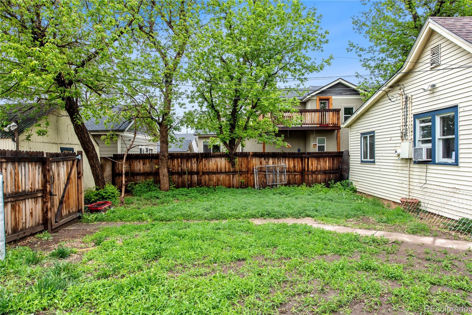 4151 Zenobia Street Denver, CO 80212 - Photo 8 of 31 a view of a house with backyard and sitting area