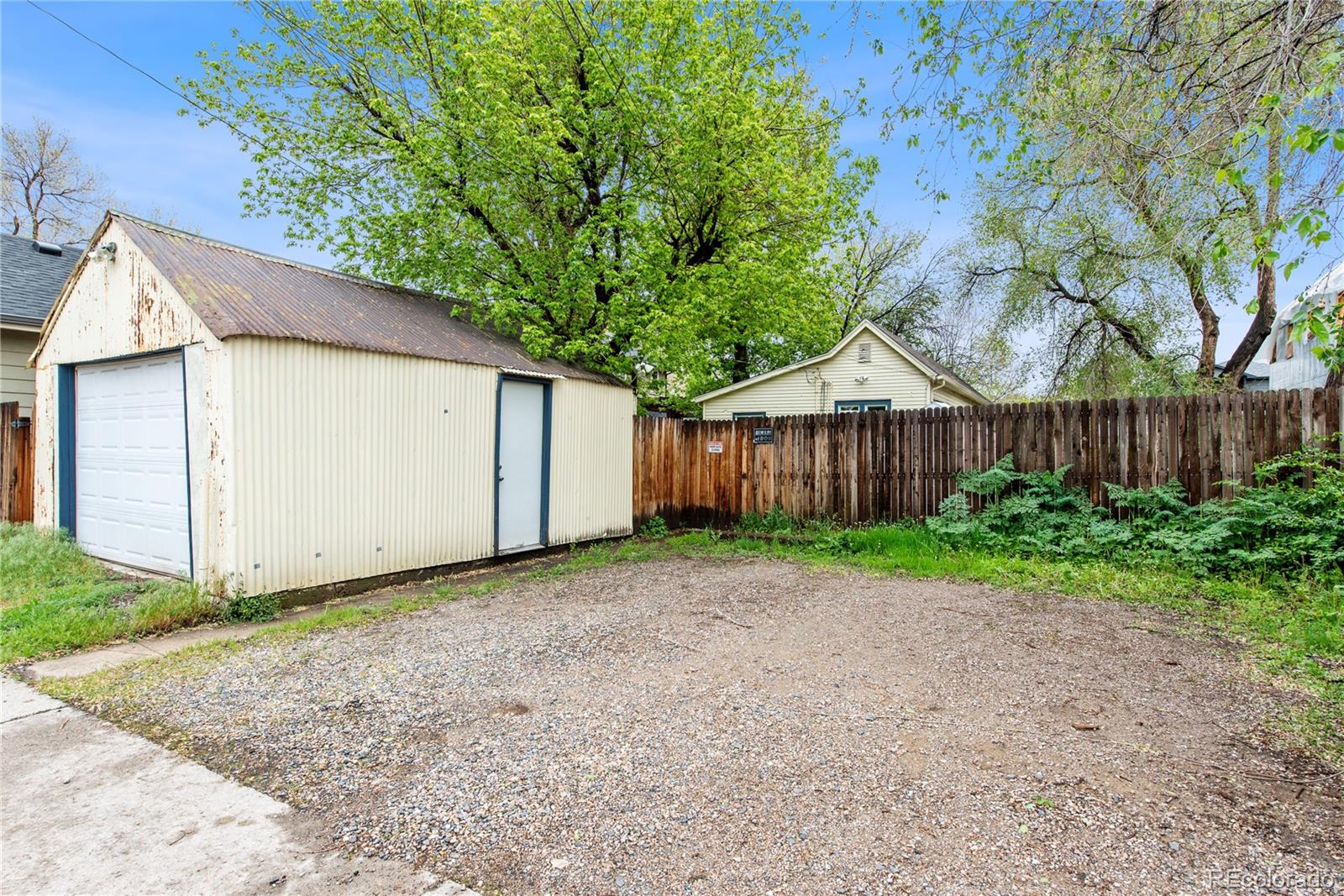 4151 Zenobia Street Denver, CO 80212 - Photo 9 of 31 a backyard of a house with wooden fence