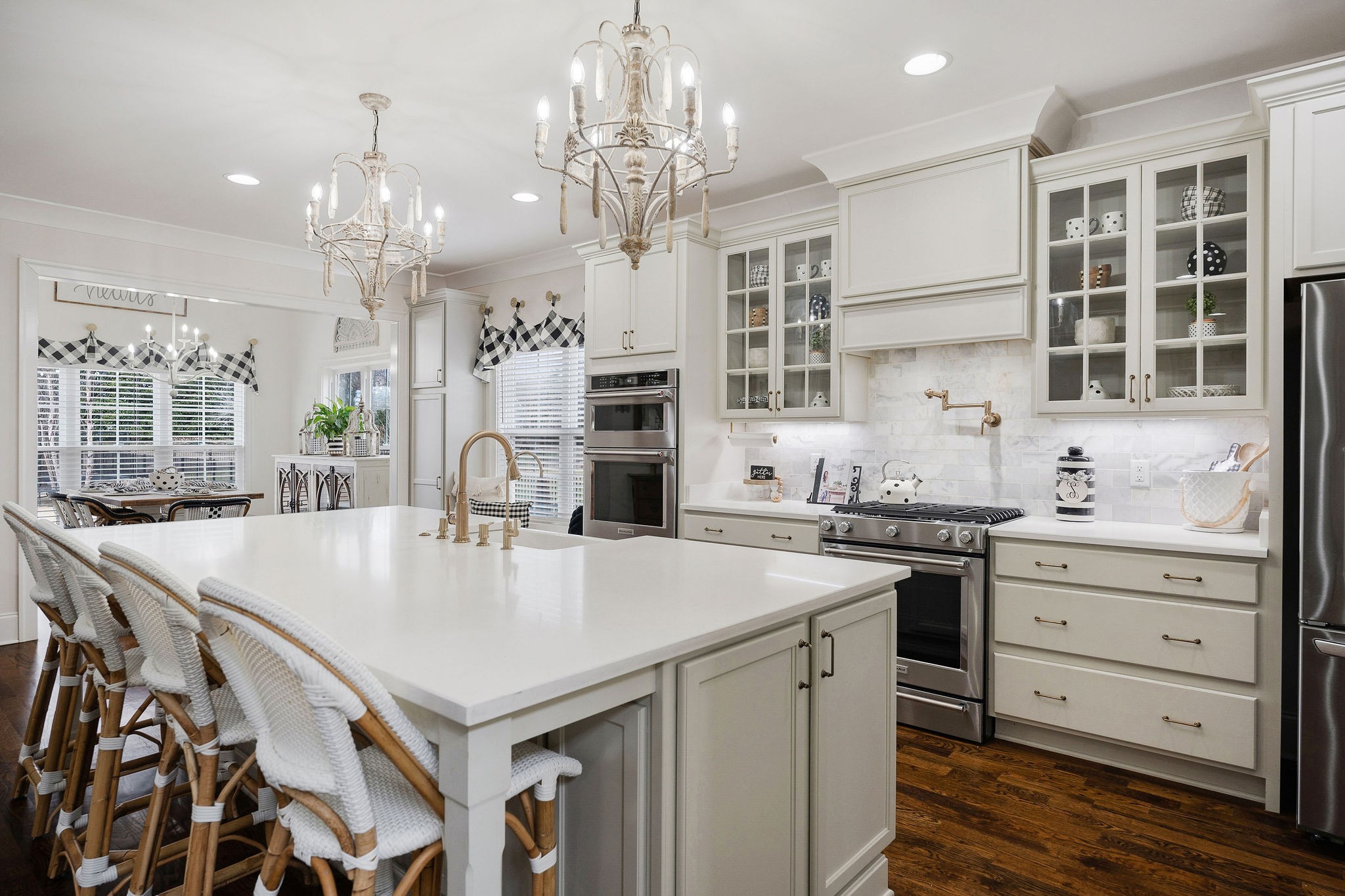 2945 Siegel Road Murfreesboro, TN 37129 - Photo 13 of 59 a large kitchen with kitchen island a stove a table and chairs