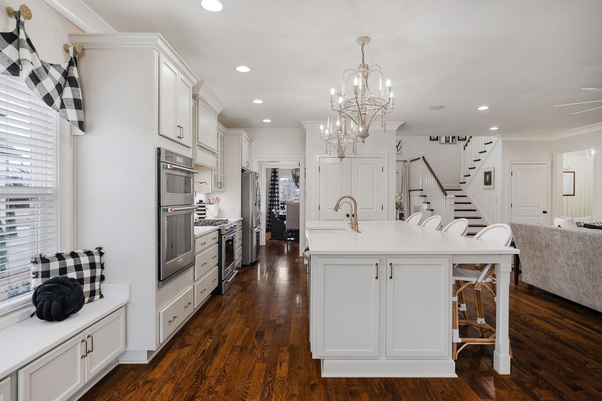 2945 Siegel Road Murfreesboro, TN 37129 - Photo 16 of 59 a kitchen with stainless steel appliances kitchen island a large counter top a sink a stove and a refrigerator