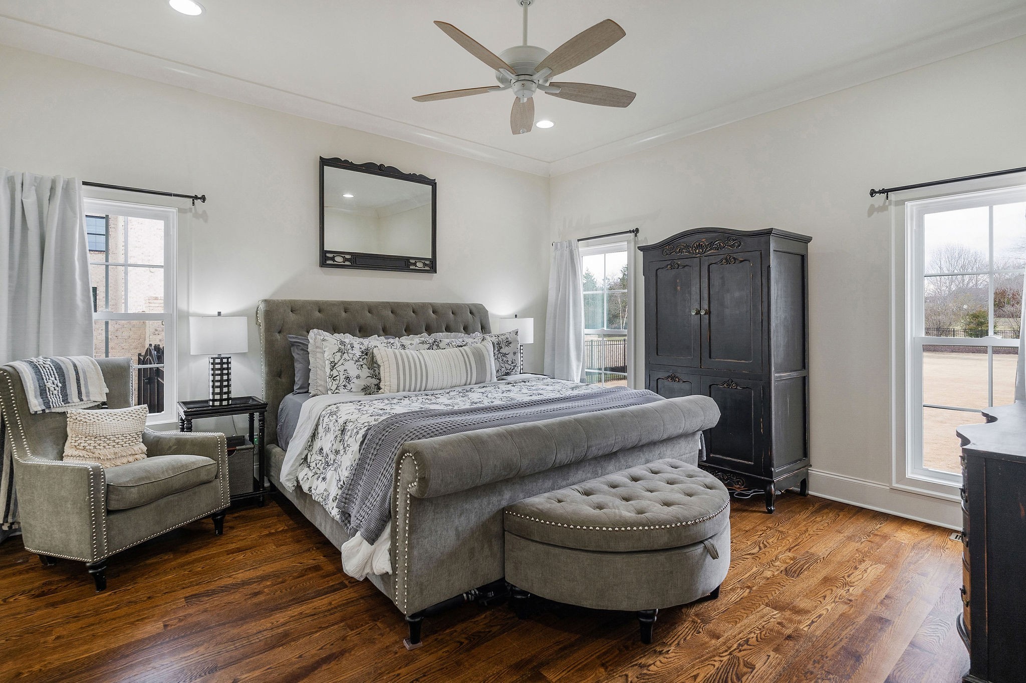 2945 Siegel Road Murfreesboro, TN 37129 - Photo 23 of 59 a bedroom with a large bed and a couch