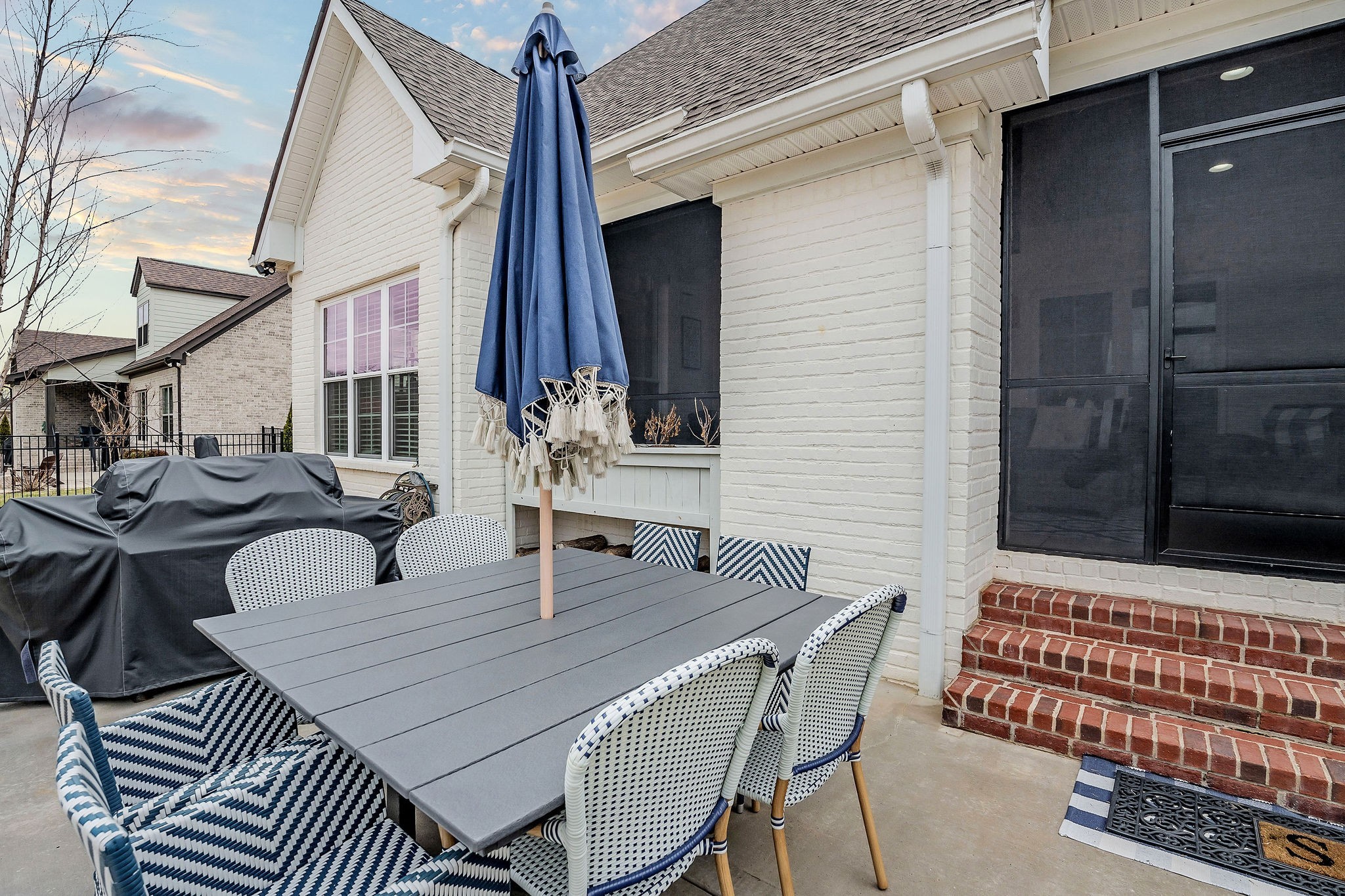 2945 Siegel Road Murfreesboro, TN 37129 - Photo 51 of 59 a view of a patio with table and chairs with wooden floor and fence