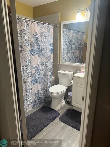 a bathroom with a sink and a shower