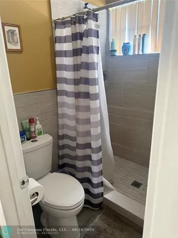 a view of a closet with storage