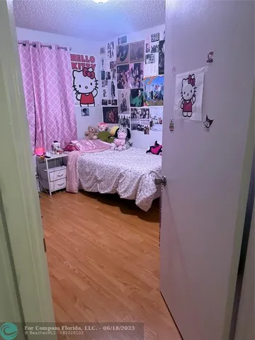 a bed room with a bed and a couch