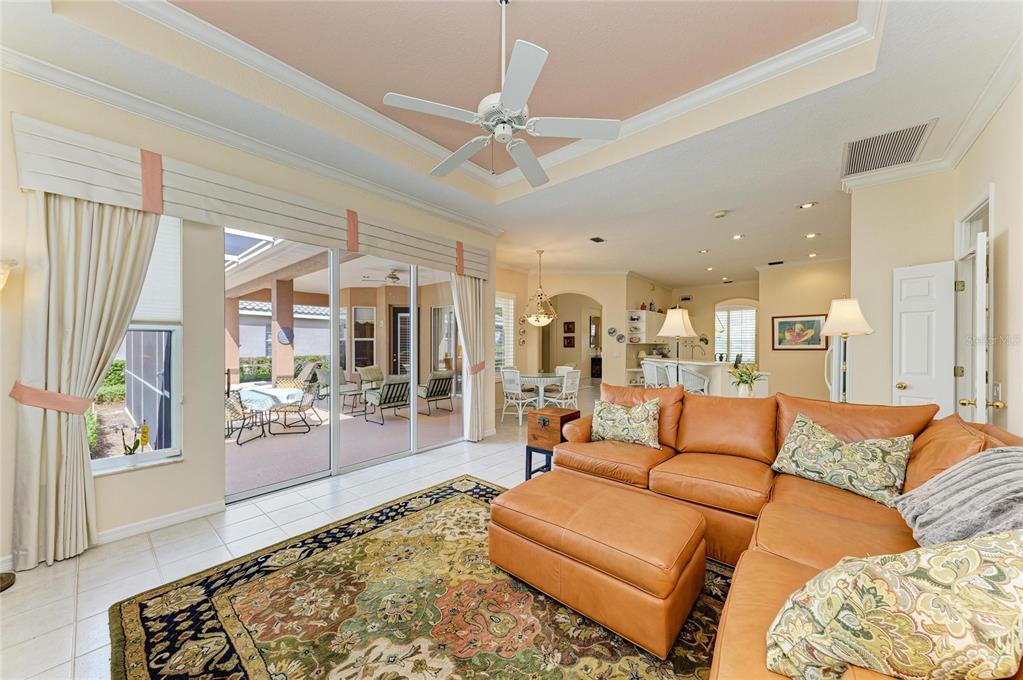 8122 Waterview Boulevard Lakewood Ranch, FL 34202 - Photo 22 of 54 a living room with furniture and a large window