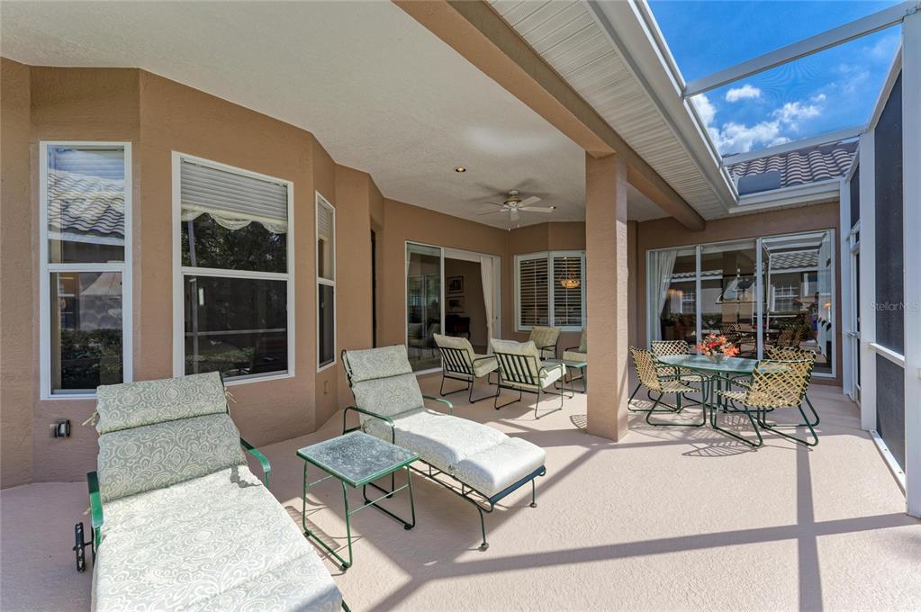 8122 Waterview Boulevard Lakewood Ranch, FL 34202 - Photo 41 of 54 a living room with furniture and large window