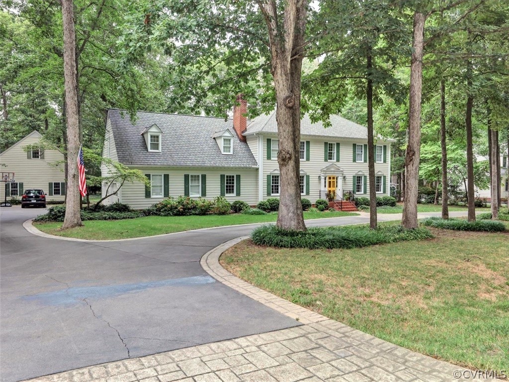 14120 Helmsley Road Midlothian, VA 23113 - Photo 2 of 32 a front view of a house with a yard