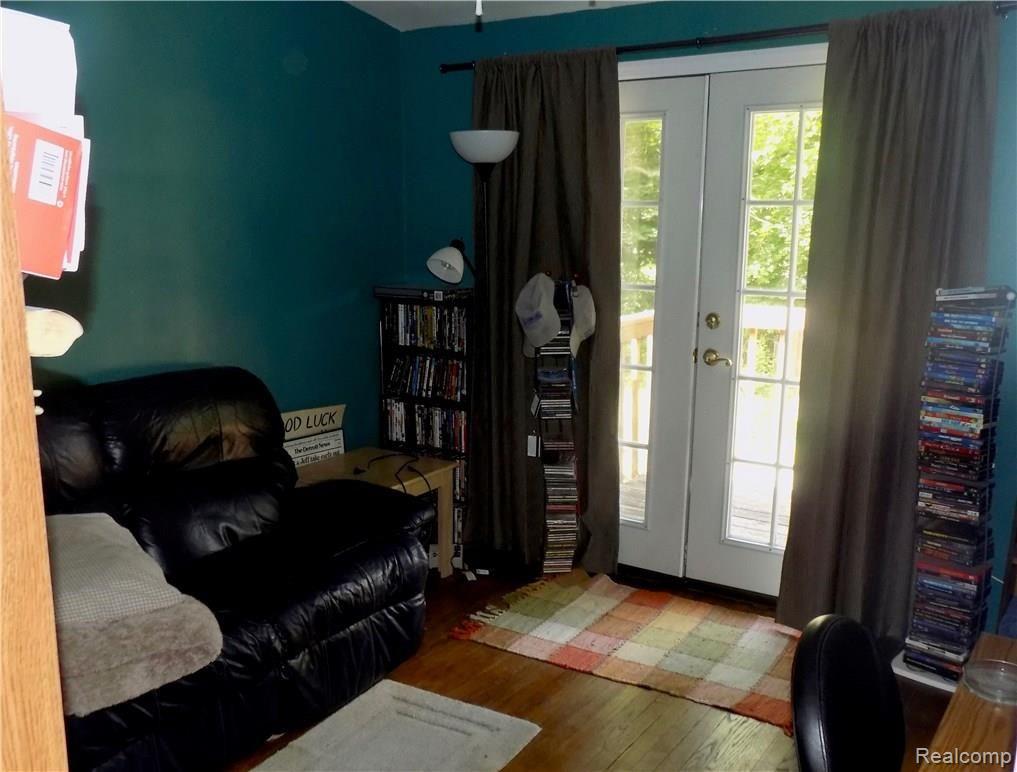 1817 Middle Trail Road Walled Lake, MI 48390 - Photo 25 of 28 BEDROOM OR OFFICE WITH QUAINT DECK THROUGH FRENCH DOORS!