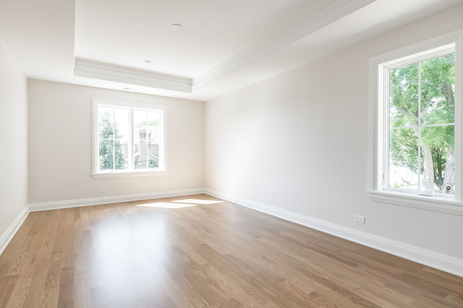 900 Colfax Avenue Elmhurst, IL 60126 - Photo 29 of 43 an empty room with wooden floor and windows