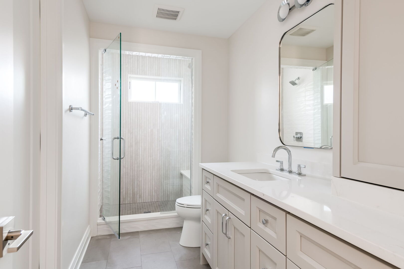 900 Colfax Avenue Elmhurst, IL 60126 - Photo 30 of 43 a bathroom with a double vanity sink toilet and shower