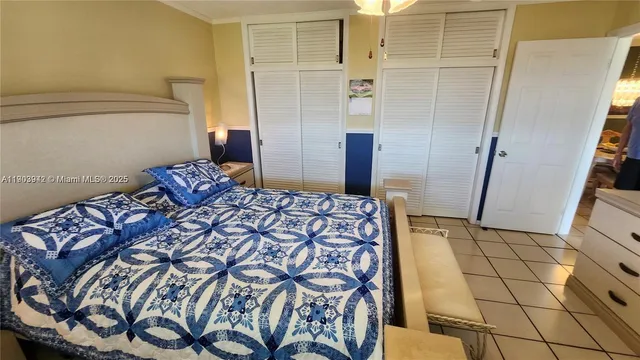 a bedroom with a bed and a shower