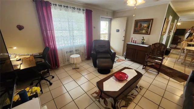 a living room with furniture and a window