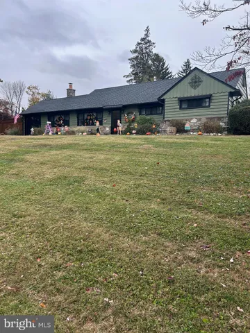 a front view of house with yard
