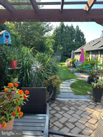 a outdoor view of a house with garden