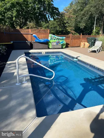 a view of outdoor space with swimming pool