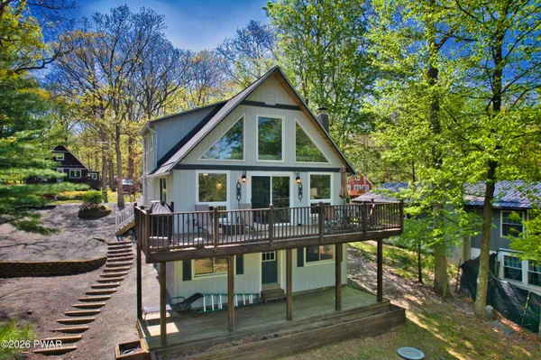 a front view of a house with swimming pool