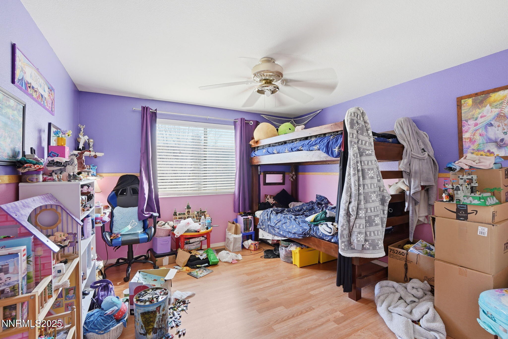 8486 Piper Place Reno, NV 89506 - Photo 14 of 25 a living room filled with furniture and a chandelier