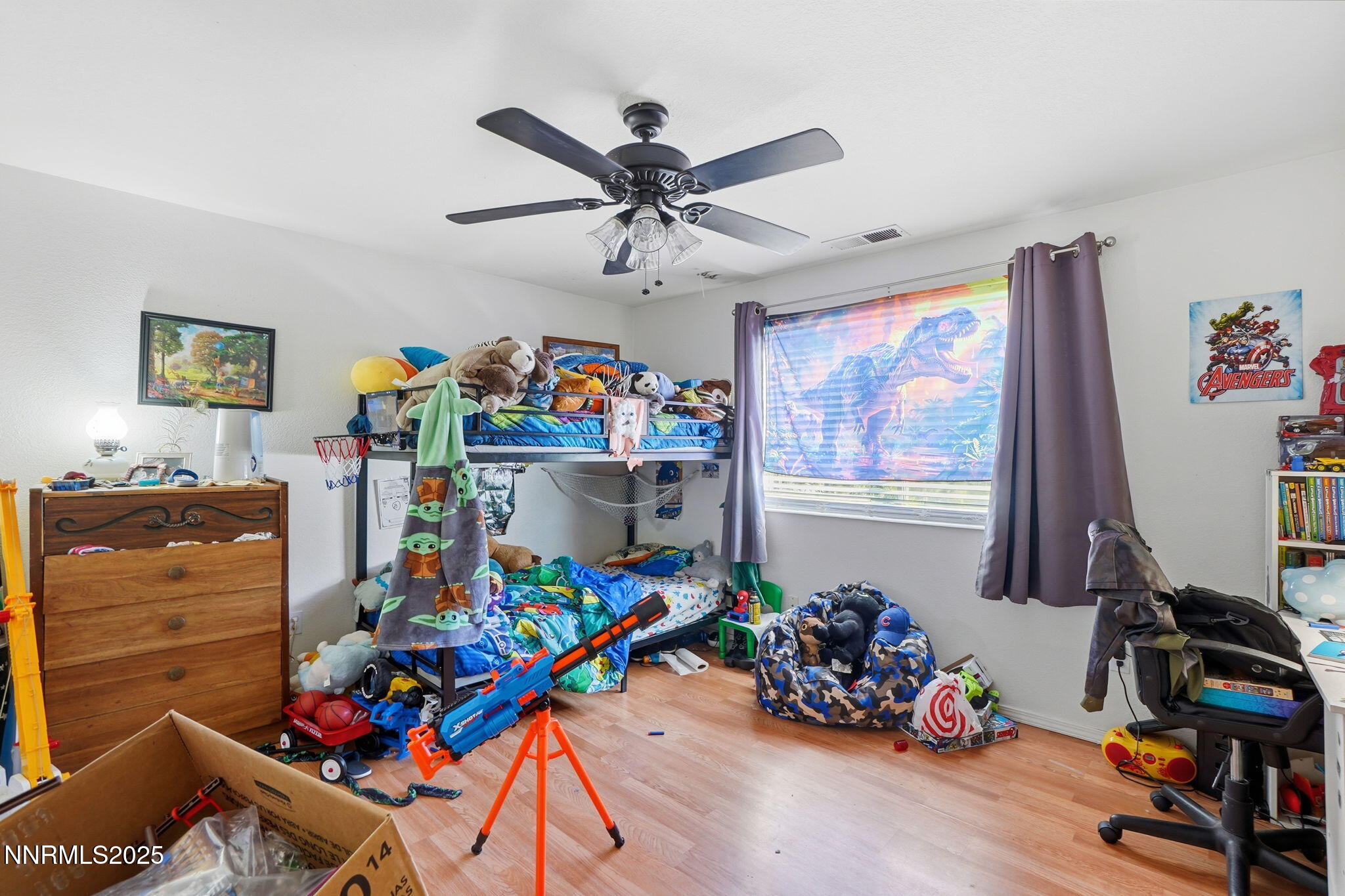8486 Piper Place Reno, NV 89506 - Photo 15 of 25 a room with toys and a wooden floor