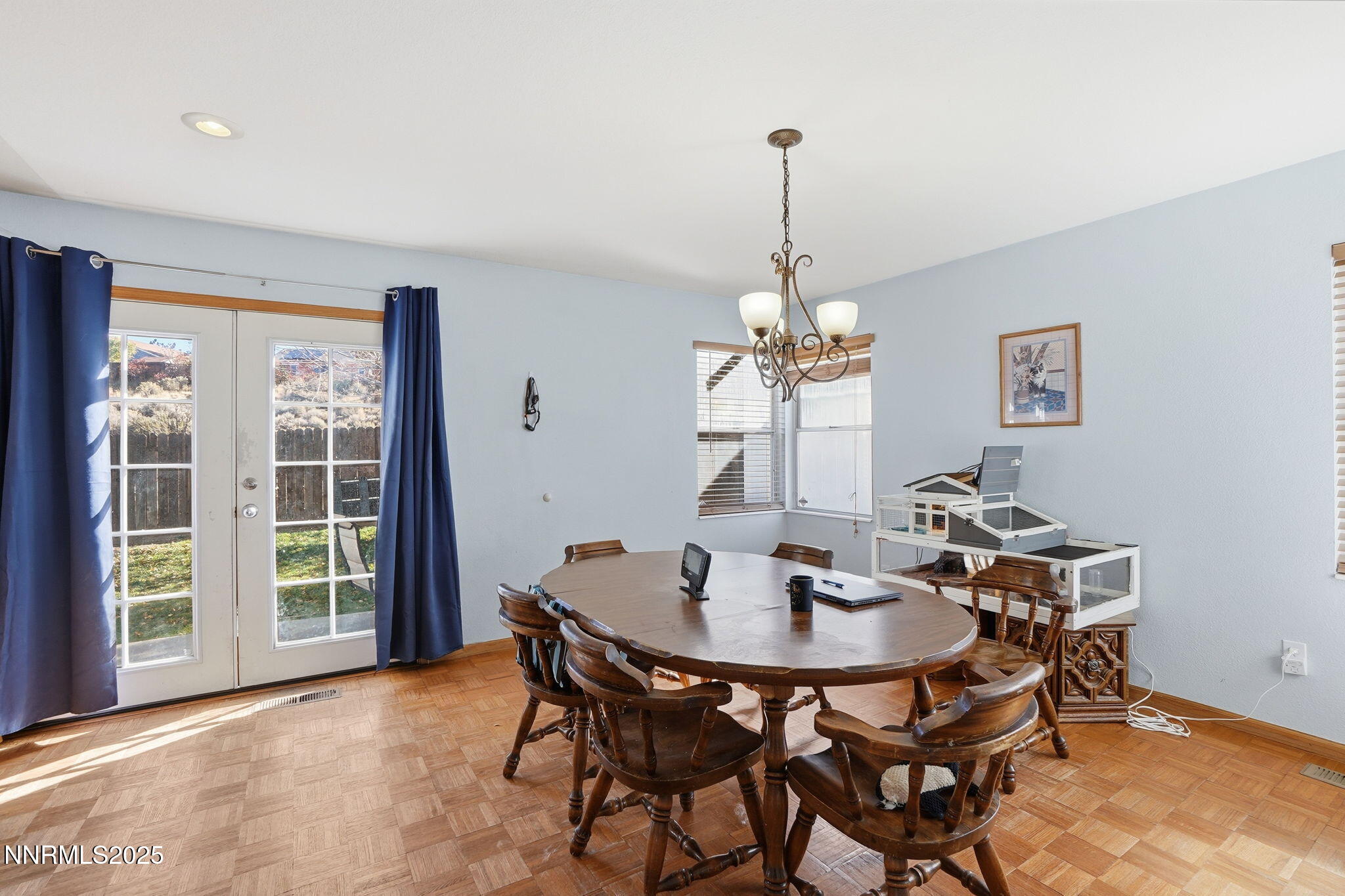 8486 Piper Place Reno, NV 89506 - Photo 7 of 25 a view of a dining room with a table and chairs