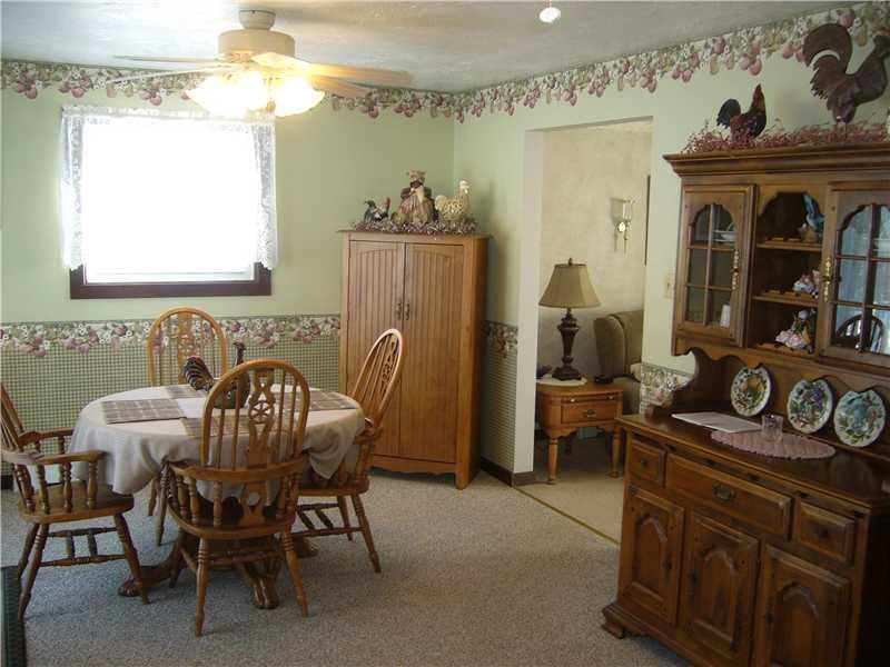 166 Steel School Road Freedom, PA 15042 - Photo 8 of 12 Kitchen. Dining area of kitchen with sliding glass door to deck!