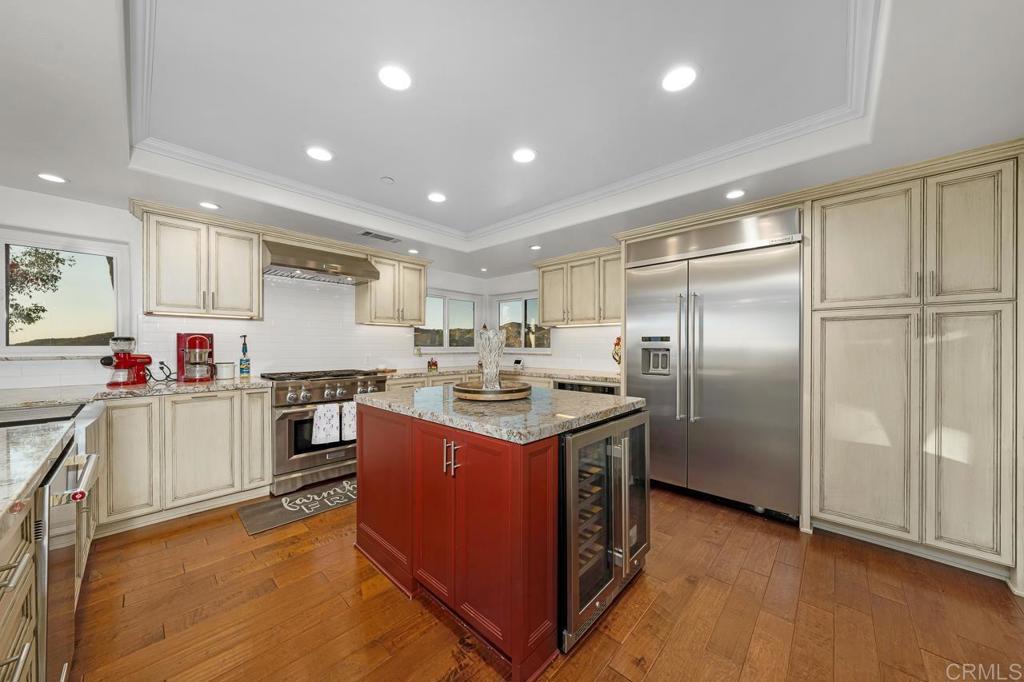 14062 Jamacha Hills Road Jamul, CA 91935 - Photo 11 of 39 a kitchen with stainless steel appliances granite countertop a sink stove and refrigerator