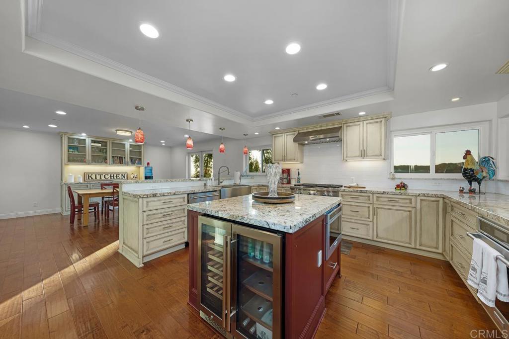14062 Jamacha Hills Road Jamul, CA 91935 - Photo 12 of 39 a kitchen with counter top space sink appliances and cabinets